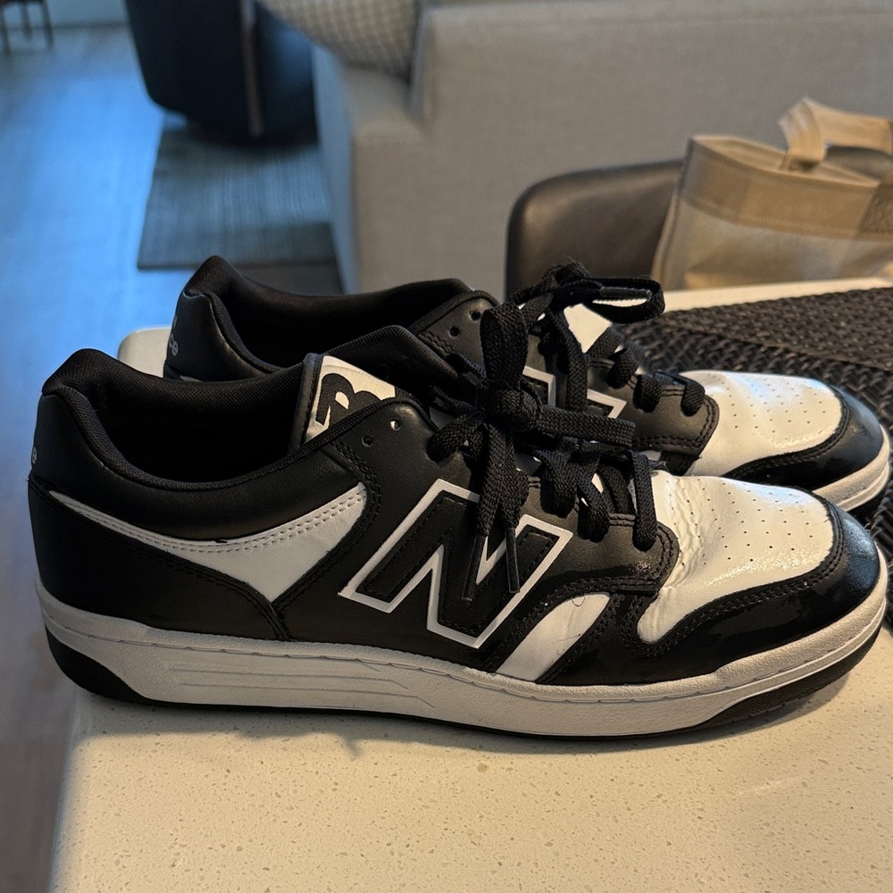 New Balance Men's Black and White Sneakers